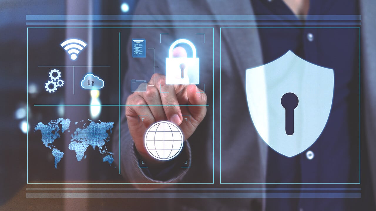 Person interacting with a futuristic digital interface focused on data security.