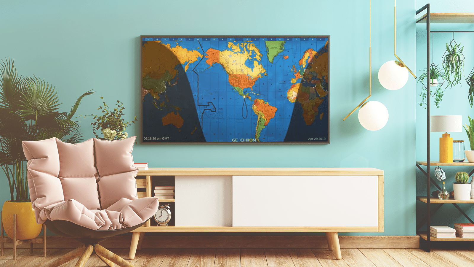 A modern living room featuring a light pink armchair, white storage cabinet, and a large world map from a timepiece