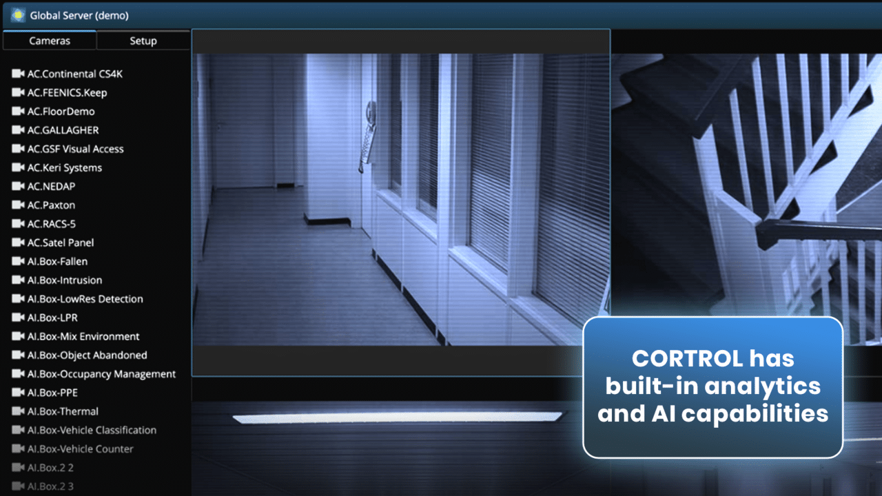  Surveillance camera interface showing a hallway with a list of camera names on the left. A text overlay highlights, "CORTROL has built-in analytics and AI capabilities." The system seamlessly integrates with Ganz Security solutions for optimal performance.